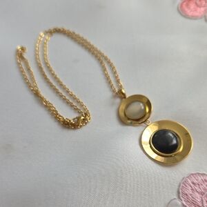Elegant Gold and Black Pendant Necklace